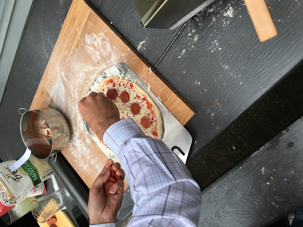 topping pizzas